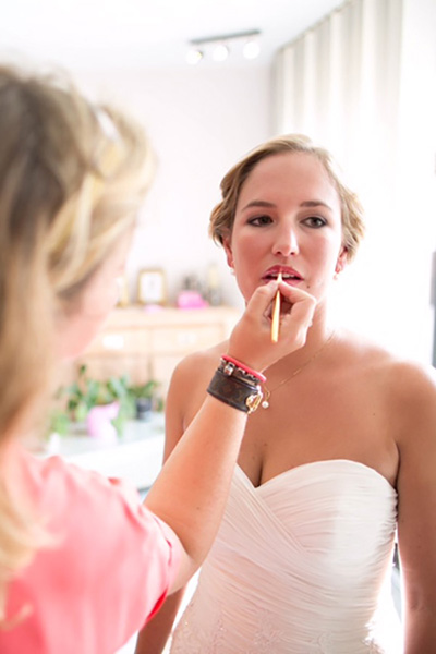 bride getting makeup on
