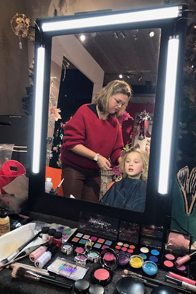 ellen styling a girls hair