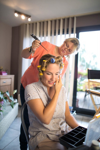 bride with curlers in